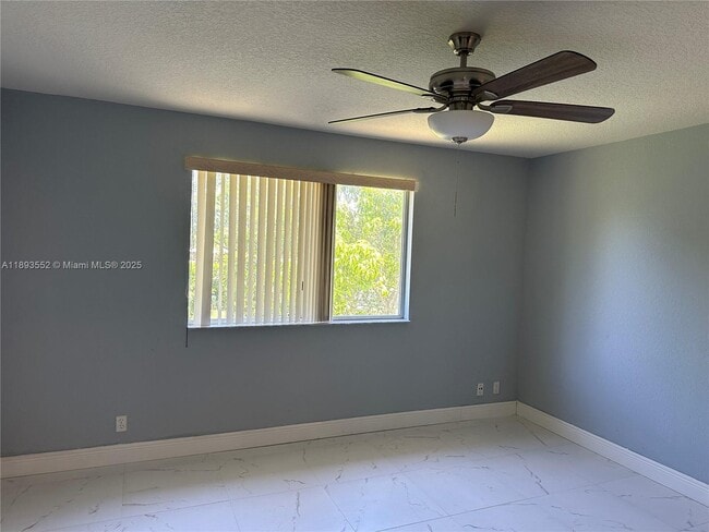 Building Photo - 7653 Tamarac Island Cir