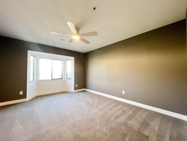 Building Photo - Beautifully Remodeled 2-Bedroom, 2-Bathroom Townhome with Single-Car Garage
