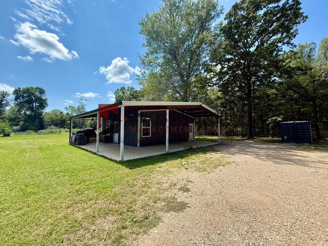 Building Photo - Tour Today! Spacious 4-Bedroom Home with Large Metal Building & Outdoor Kitchen