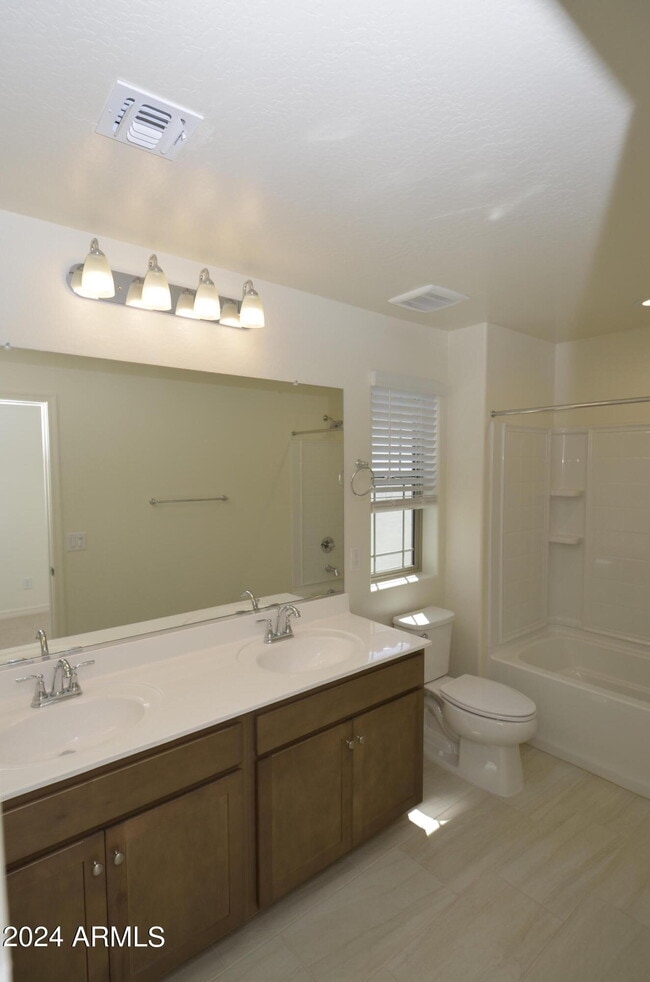 Building Photo - 1306 W Sparrow Dr