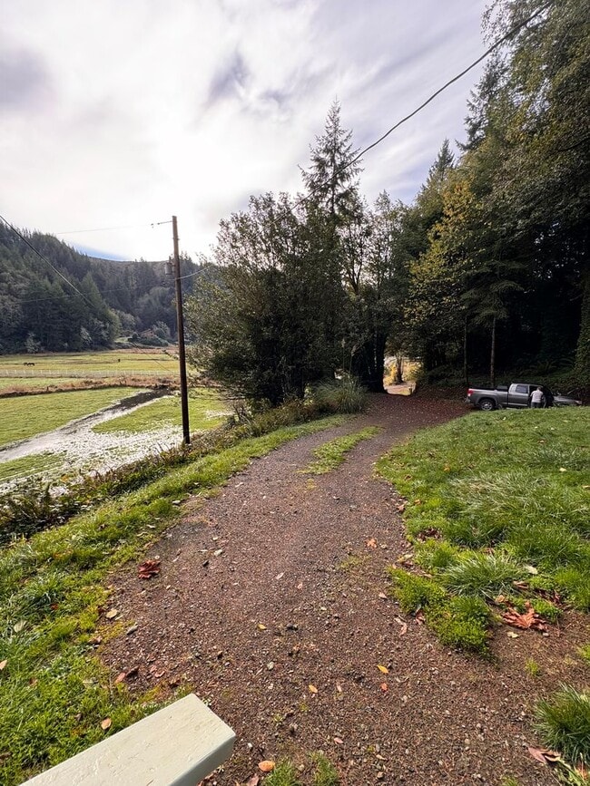 Building Photo - YOUR PACIFIC NORTHWEST RETREAT AWAITS! AV CHARGING STATION, GORGEOUS VIEWS, PRIVACY AND MORE!