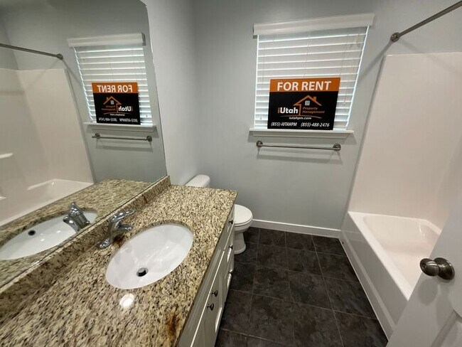Building Photo - 4 bdrm 3 bth Home 2 Car Garage- Small Dog ...