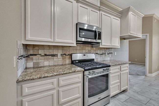 Building Photo - One story, and a 3-car garage!