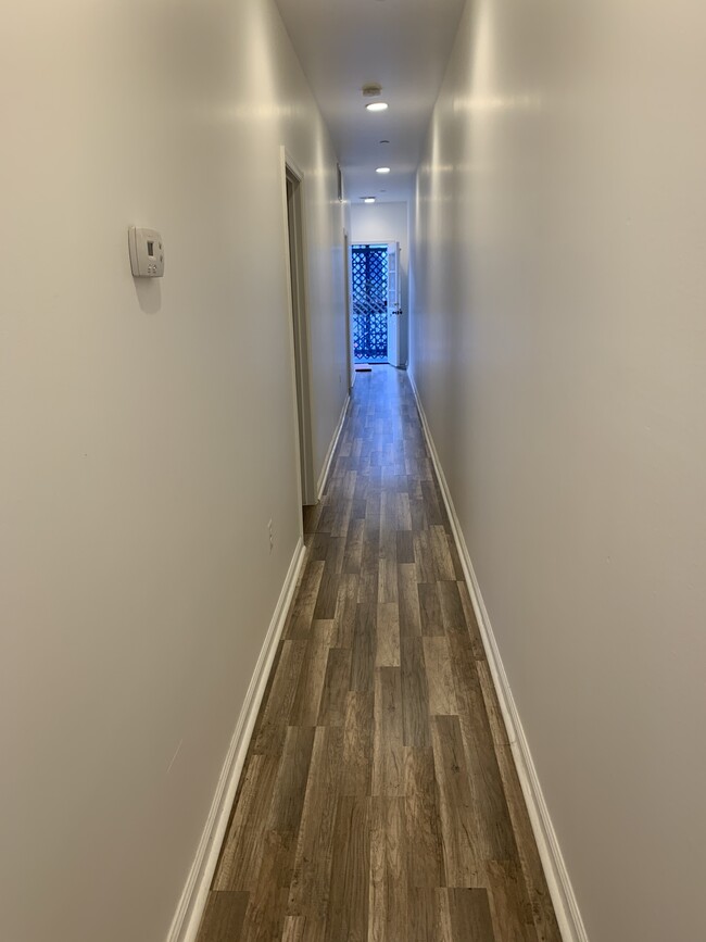 1st floor hallway to bedroom and back exit - 3120 13th St NW