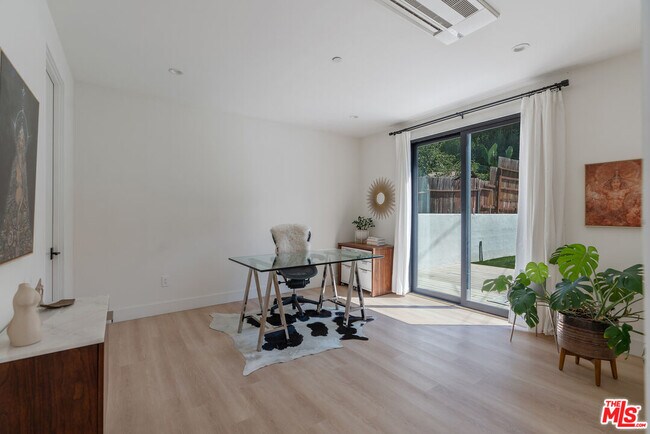 Building Photo - 5265 Dahlia Dr