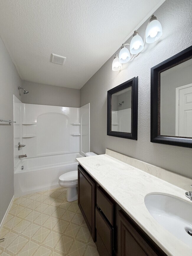 Building Photo - 7209 Huckaby Ave