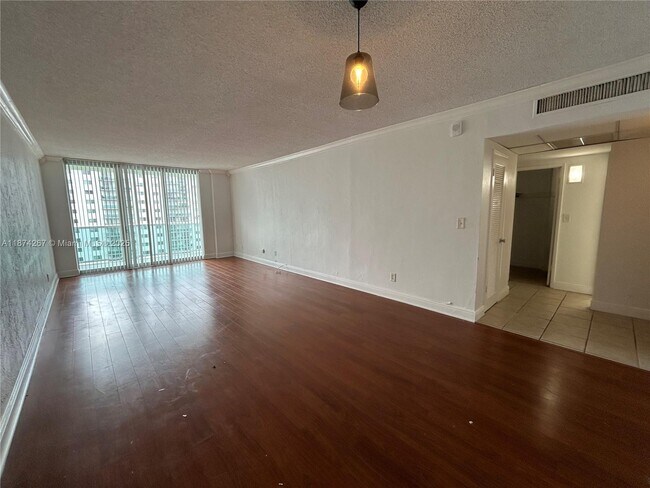 Building Photo - 19390 Collins Ave