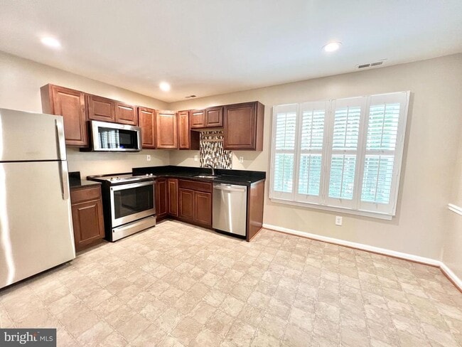 Building Photo - 5504 Woodlawn Manor Ct