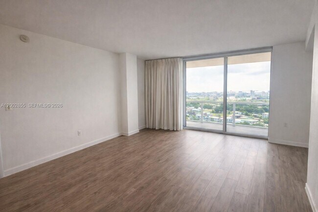 Building Photo - 10275 Collins Ave