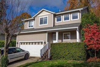 Building Photo - Three bedroom home with a bonus room and Air Conditioning - Built in 2000