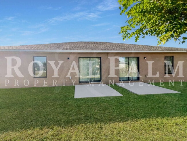 Building Photo - 3 Bed 2 Bath in Cape Coral — Curb Appeal. Fresh Style. Zero Hassle.