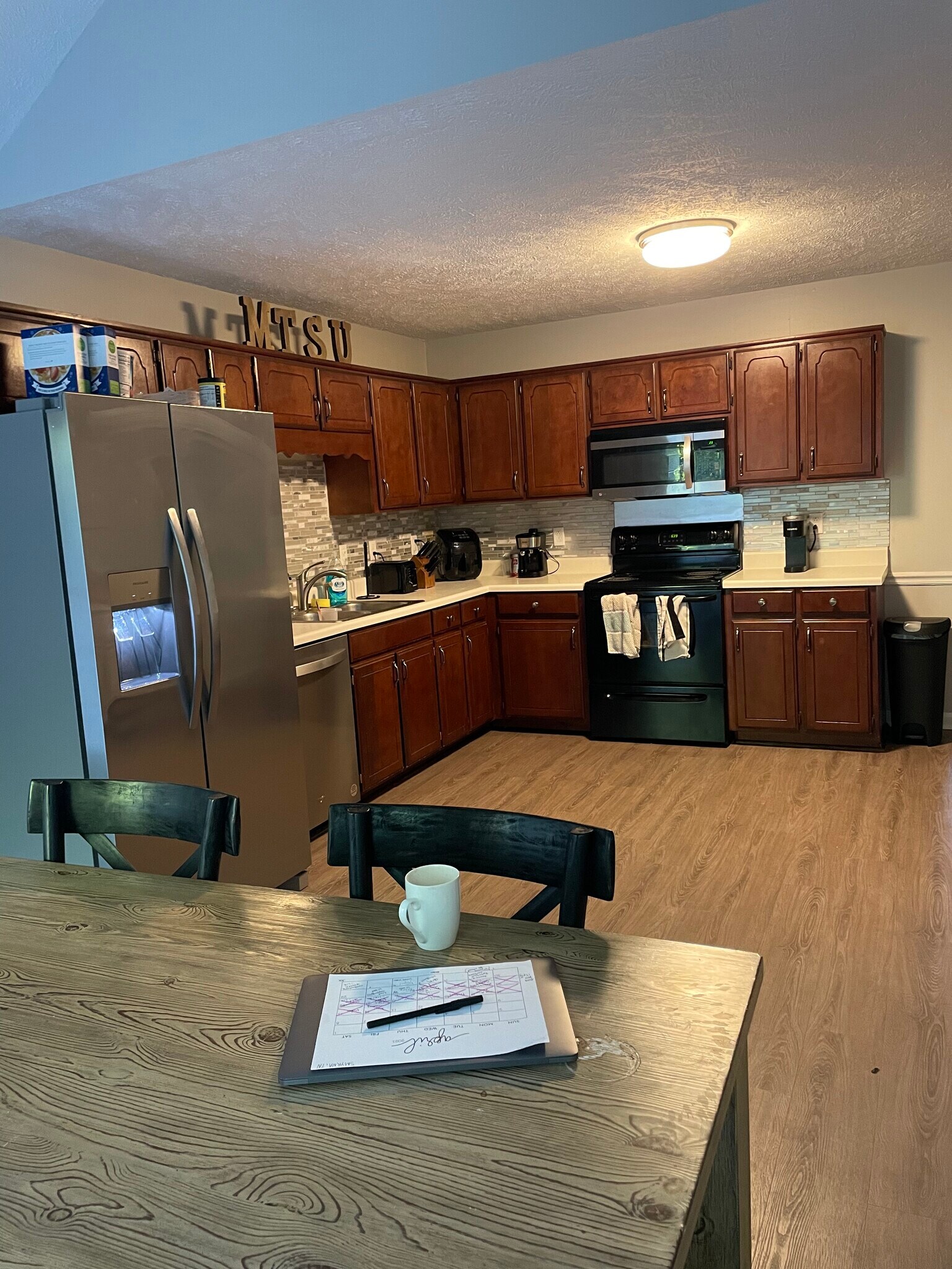 kitchen looking towards front of house - 1122 Woods Edge Dr