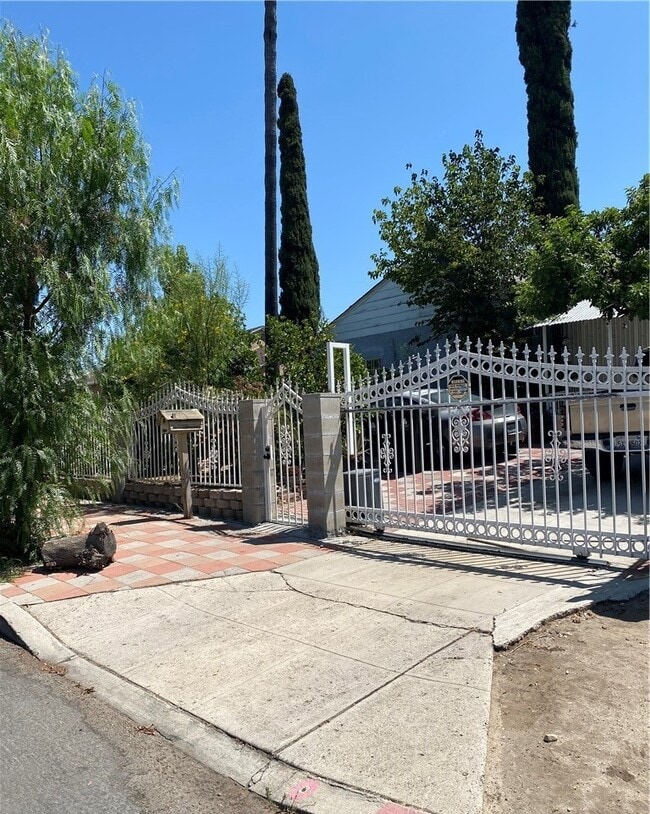 Building Photo - 7660 Radford Ave