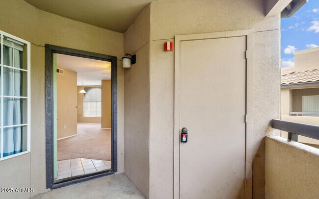 Building Photo - 9451 E Becker Ln