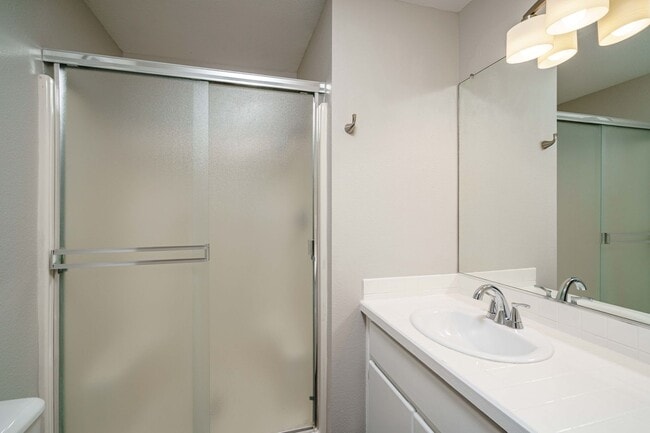 Building Photo - Recently Updated with Wood Laminate Flooring and Fresh Paint