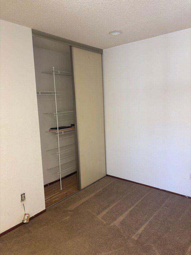 Building Photo - Charming Two-Bedroom, Two-Bath Duet in Pri...
