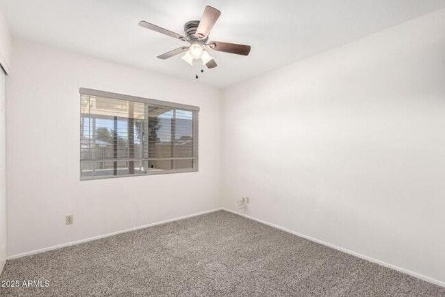 Building Photo - Beautiful three-bedroom, two-bath with pool and RV parking, available now.