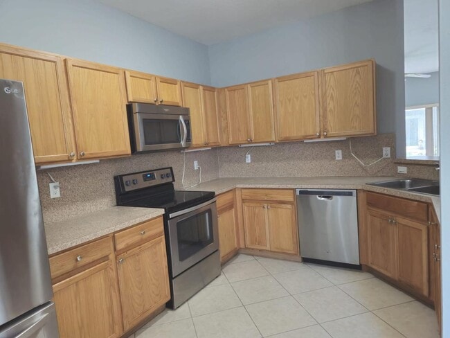 Building Photo - Prime Location & Modern Comfort in Greenacres! 3 Bed 2.5 Bath Townhouse