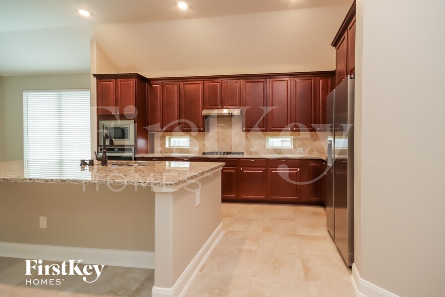 Building Photo - 8723 Jonquil Dr