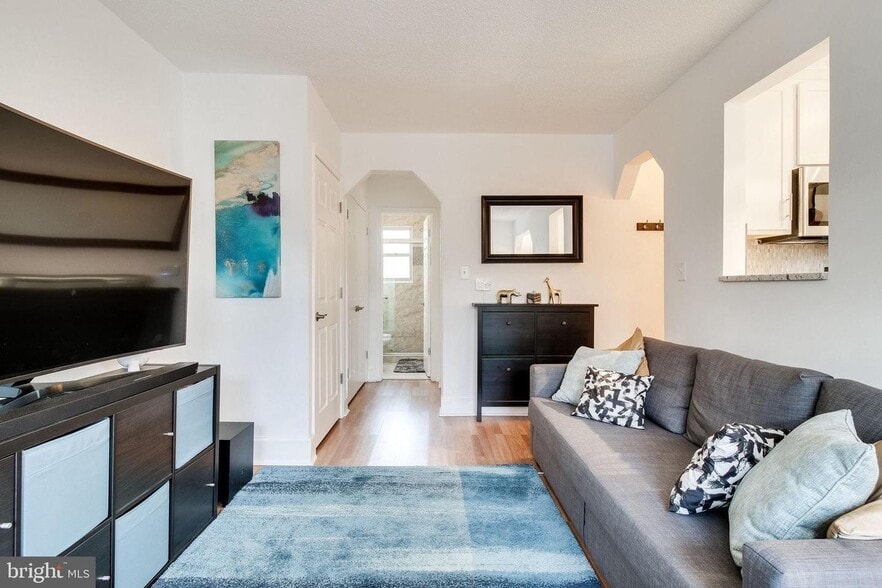 Living room with view to bathroom - 1363 K St SE