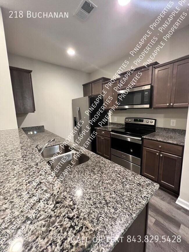 Building Photo - 218 Buchanan-