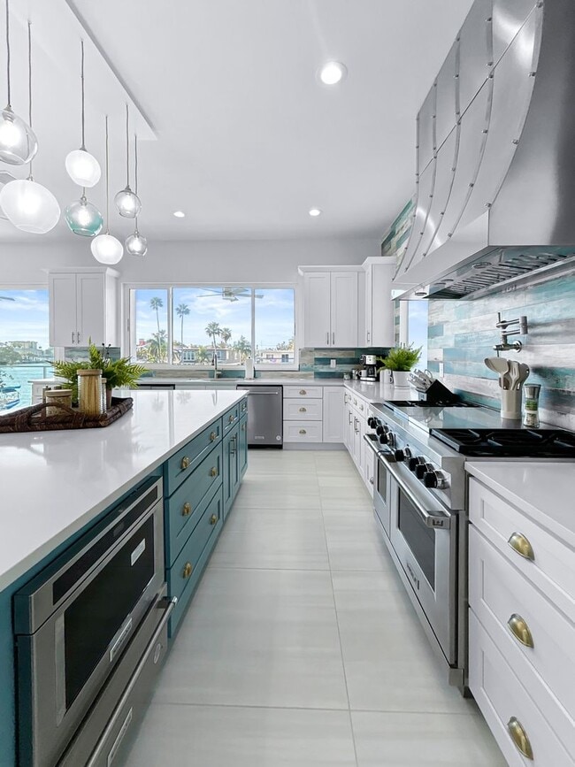 Building Photo - Waterfront Johns Pass Luxury | Steps to Beach + Pool, Hot Tub & Dock