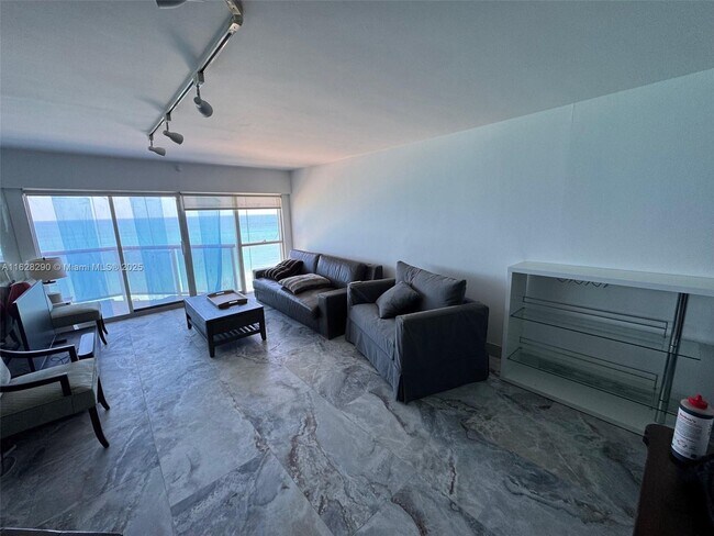 Building Photo - 6767 Collins Ave