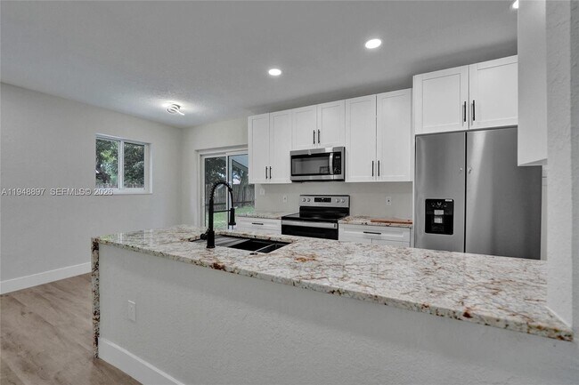 Building Photo - 21021 NE 13th Pl