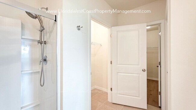 Building Photo - MOVE IN READY ! 4 BEDROOM/2 BATH! TILE- LVP THROUGHOUT! LAWN MOWING INCLUDED!