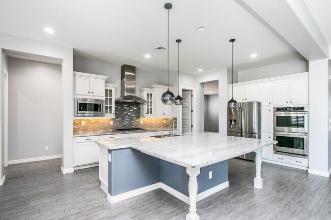 Building Photo - COMING SOON!! Custom single level Luxury home with pool and 4 car garage