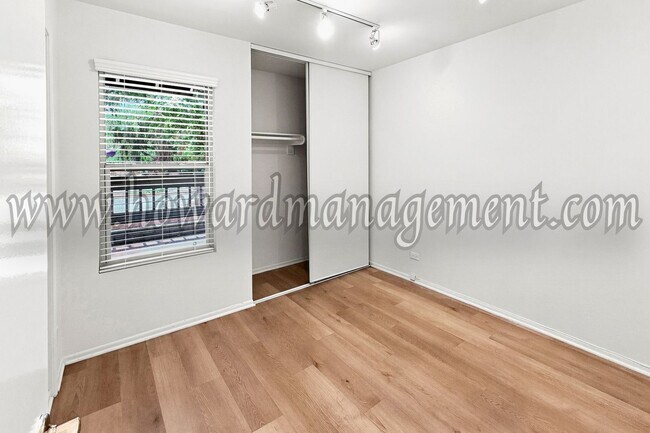 Building Photo - LAKE VIEW in LA! Majestic townhouse with high ceilings, three patios and lake view!
