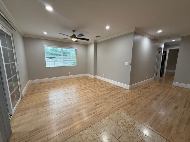 Building Photo - MOVE IN READY 2/2 with 2 Assigned Parking! In Unit Washer & Dryer! Gated Community! Centrally Loc...