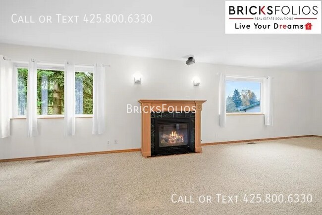 Building Photo - Welcome to Tukwila Haven – Open Concept Home Near Sound Transit!