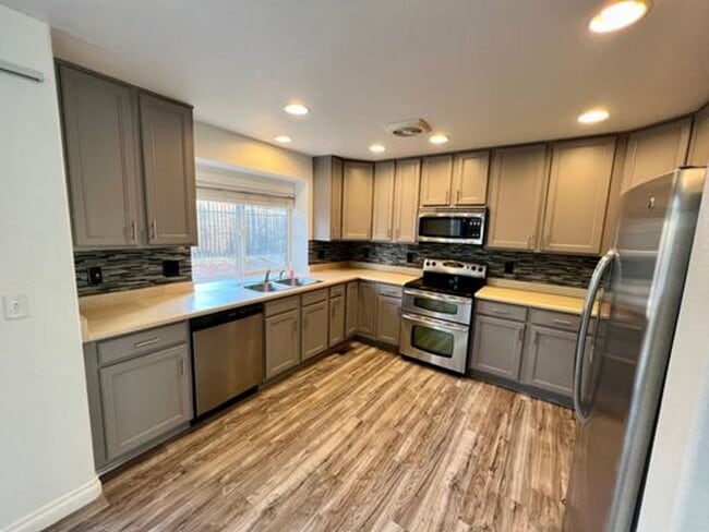 Building Photo - $0 DEPOSIT OPTION! BEAUTIFUL TWO-STORY HOM...