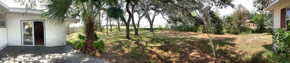 Backyard view with the house behind. - 4513 Howard St