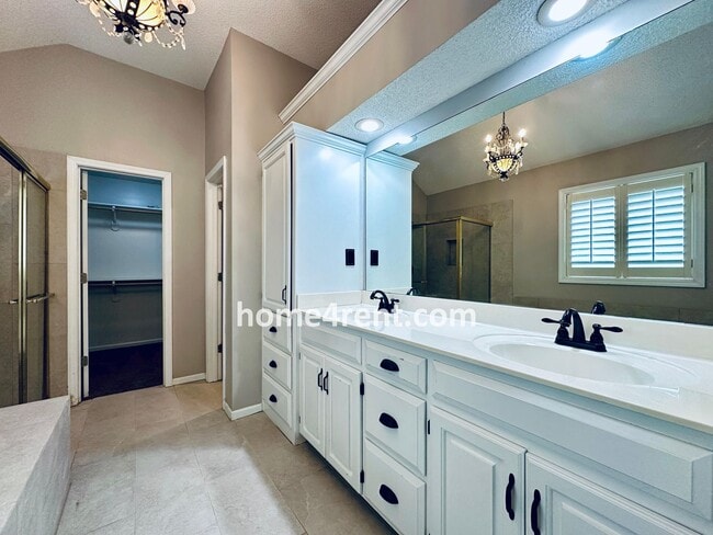 Building Photo - Updated Kitchen, Large Two Tiered Deck, Finished Basement in Blue Valley Schools!