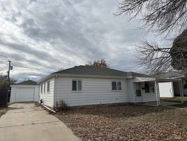 Building Photo - Spacious 4-Bed Home with Garage Near I-225 and Parks!