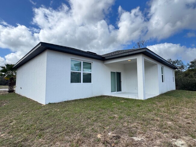 Building Photo - Spacious 4-Bedroom Home in Poinciana – Internet Included & No HOA Approval Required