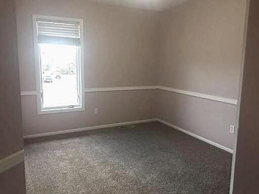 Building Photo - Spacious East Anchorage Home with Yard & Garage!