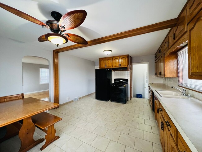 Building Photo - Elegant 4-bedroom Home with Chef’s Kitchen, 2 Full Bath, and Two-Car Garage