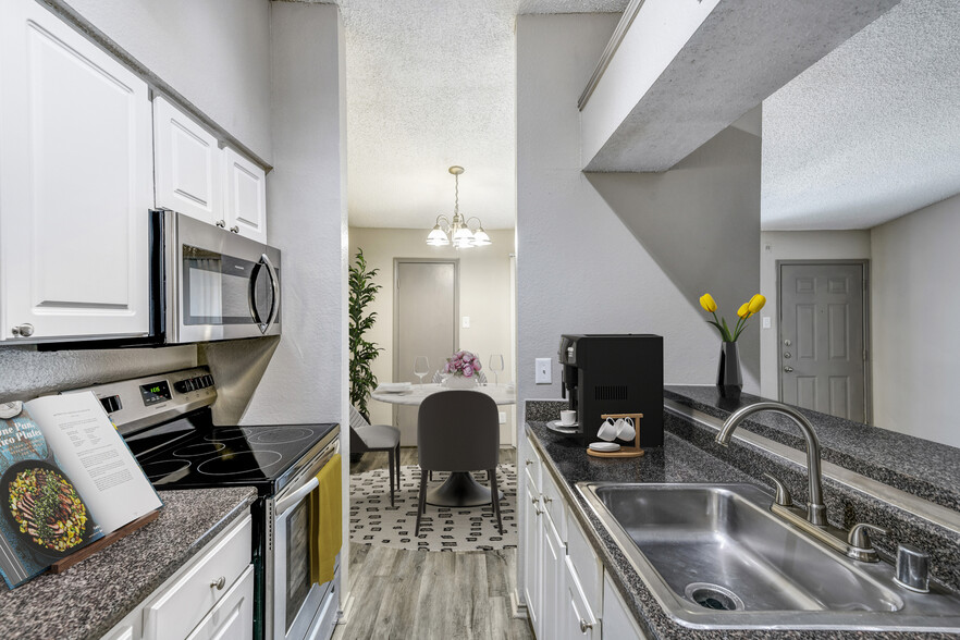 Kitchen with Upgraded Stainless Steel Appliances - Vue at Knoll Trail Apartments