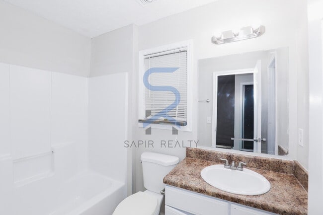 Building Photo - Move in before February 15th and choose your reward: a $250 Amazon Gift Card or a 55" Smart TV!