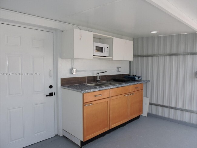 Building Photo - 5451 W 10th Ave