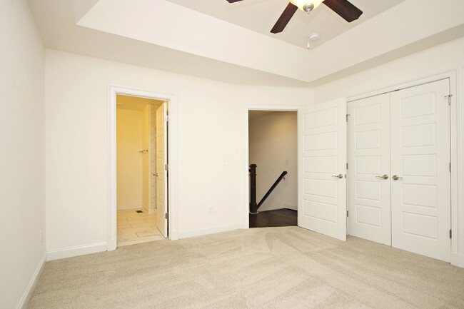 Building Photo - Light-Filled Townhome With Utilities Inclu...