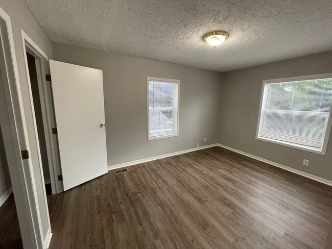 Building Photo - For Rent: Four-Bedroom, Two-Bathroom Single Family Home