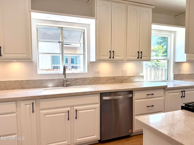 Building Photo - 7741 De Soto Ave