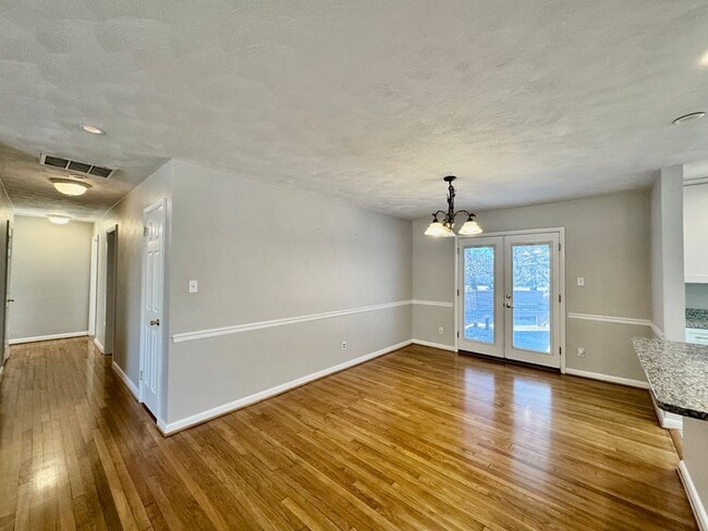 Building Photo - Available NOW! Lakefront 4 Bedroom/2 Bath Home, Pet-Friendly, Fenced Yard, Great School Zones!