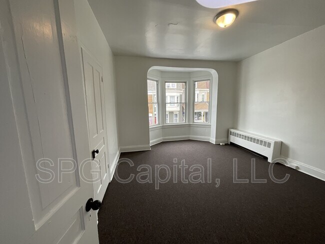 Building Photo - 938 W College Ave