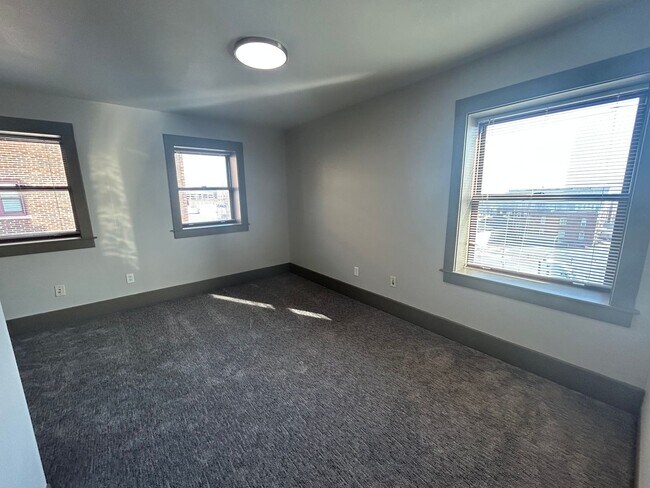 Building Photo - Solid surface countertops, stainless steel...