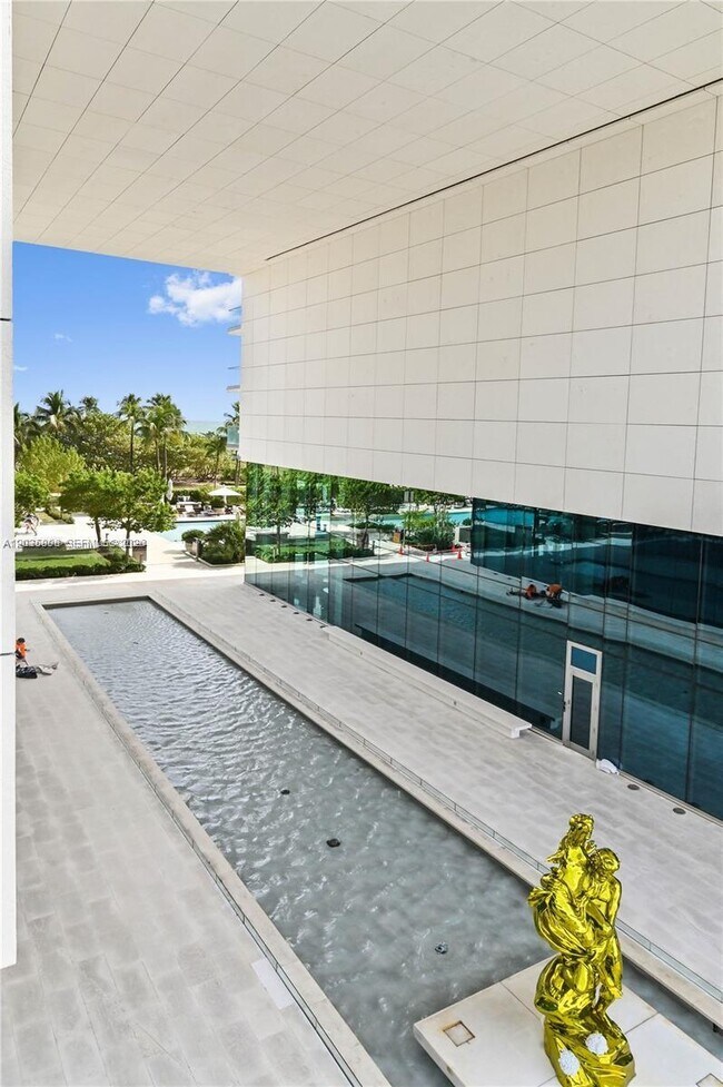 Building Photo - 10203 Collins Ave
